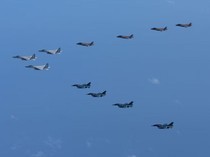 1763744712006-jet-tempur-jepang-dalam-latihan-militer-gabungan-dengan-as_43