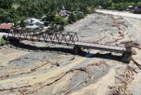 1764565548310-jembatan-beutong-ateuh-nagan-raya-putus-diterjang-banjir-bandang-1764506985657_43