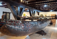 1765710307381-perahu-cadik-papua-di-museum-kehabarian-jakarta-utara-1765694354244_43